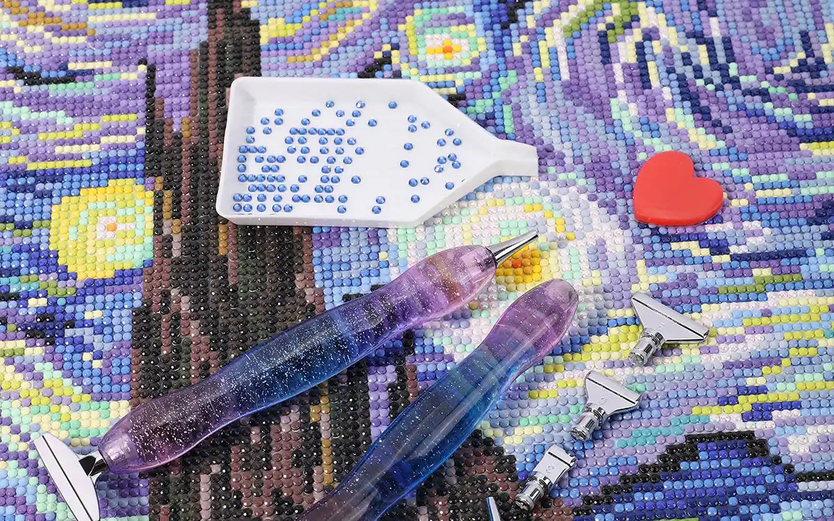 Applying drills on canvas using a diamond painting kit