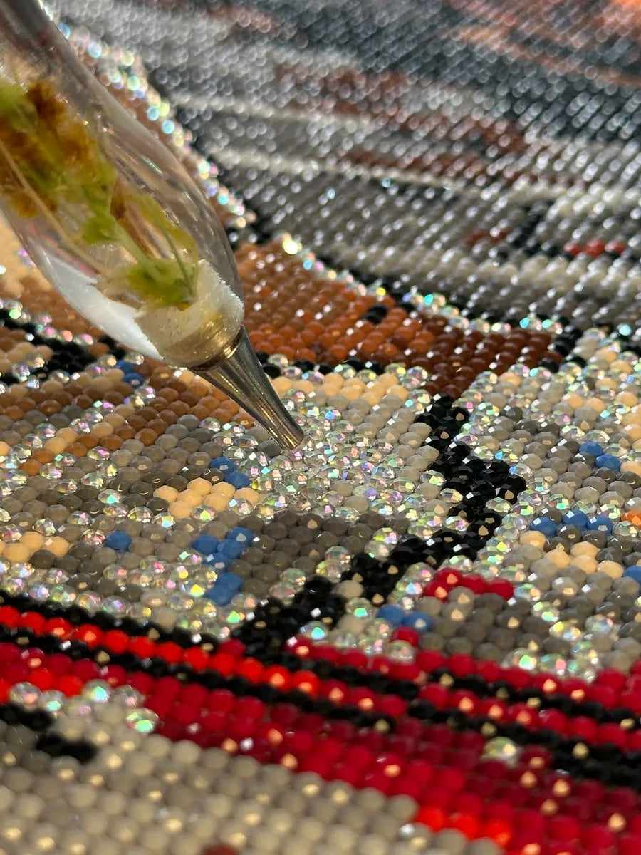 Close-up of Dark Fairy Sleeping Beauty diamond painting in progress showing sparkling resin drills and precise detailing – FEELOOK Art