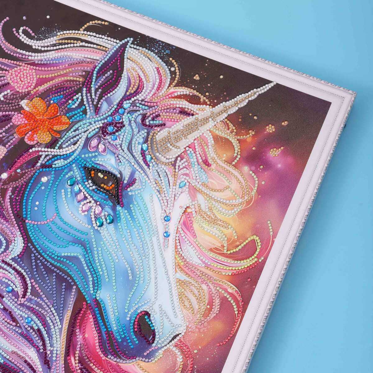Blooming Unicorn diamond painting close-up with a colorful unicorn, floral details and sparkling drills - FEELOOK Art