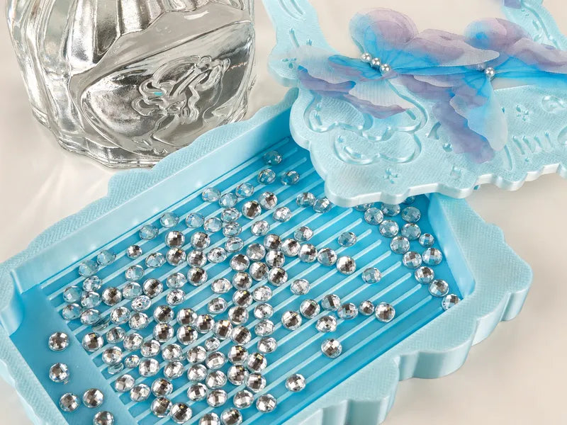 Clear crystal special shaped drills in a blue tray with soft floral decor for sparkling diamond painting details - FEELOOK Art