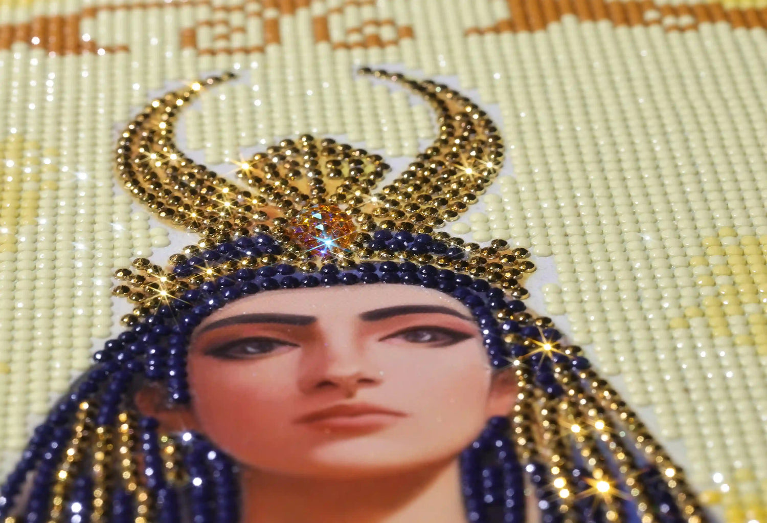 Close-up of isis diamond art featuring a large special-shaped crystal on the goddess’s forehead in warm golden tones - FEELOOK Art
