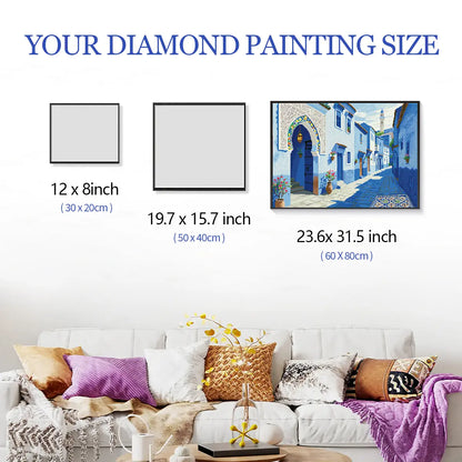 Chefchaouen Blues diamond painting framed and hung on the wall with size indicators, displayed above a sofa beside other framed artworks for size reference – FEELOOK Art