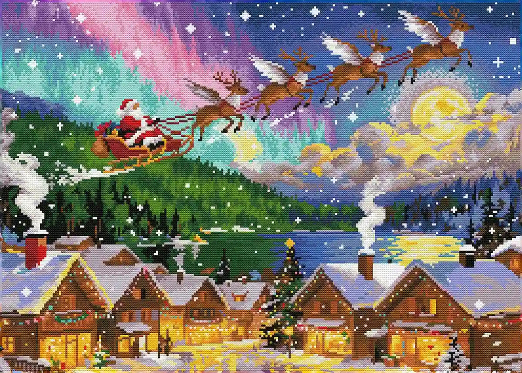 Finished Christmas Town diamond art showing sparkling snow, glowing houses, and colorful night sky – FEELOOK Art