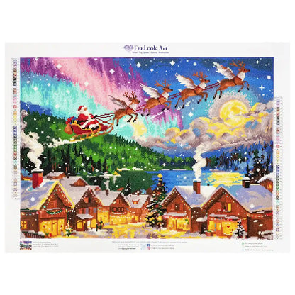 Christmas Town diamond painting of a magical snowy village under moonlight and Santa’s sleigh - FEELOOK Art