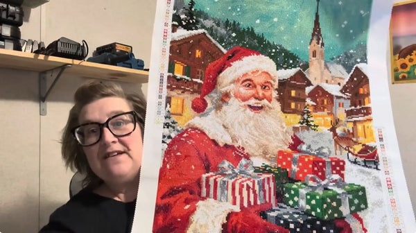 Customer showing a completed Santa Christmas diamond painting - FEELOOK Art