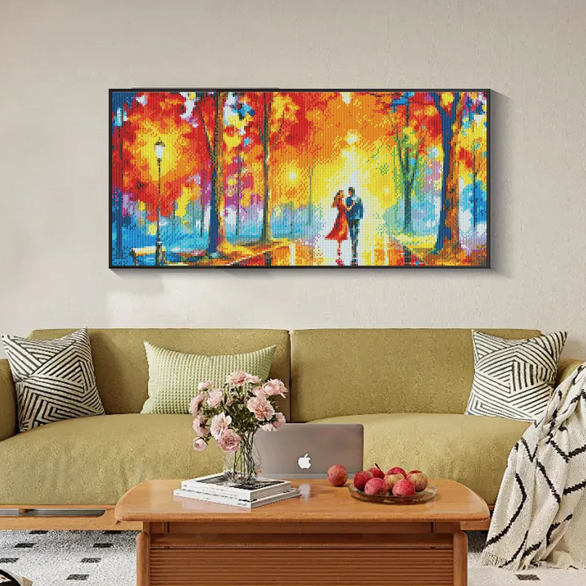 Framed romantic diamond painting displayed above couch, ideal for exploring the world of diamond painting.