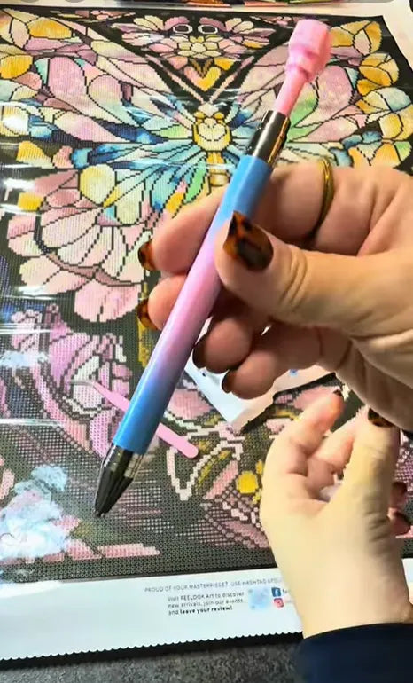 Diamond painting pen shown over the colorful Prismatic Butterfly canvas - FEELOOK Art