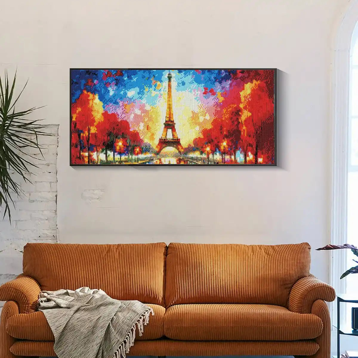 Magical rainbow castle artwork on wall in colorful fantasy decor.