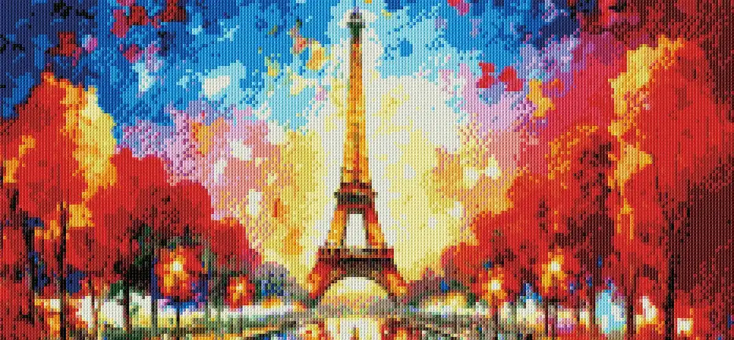 Colorful castle beneath rainbow sky in completed diamond painting mockup.