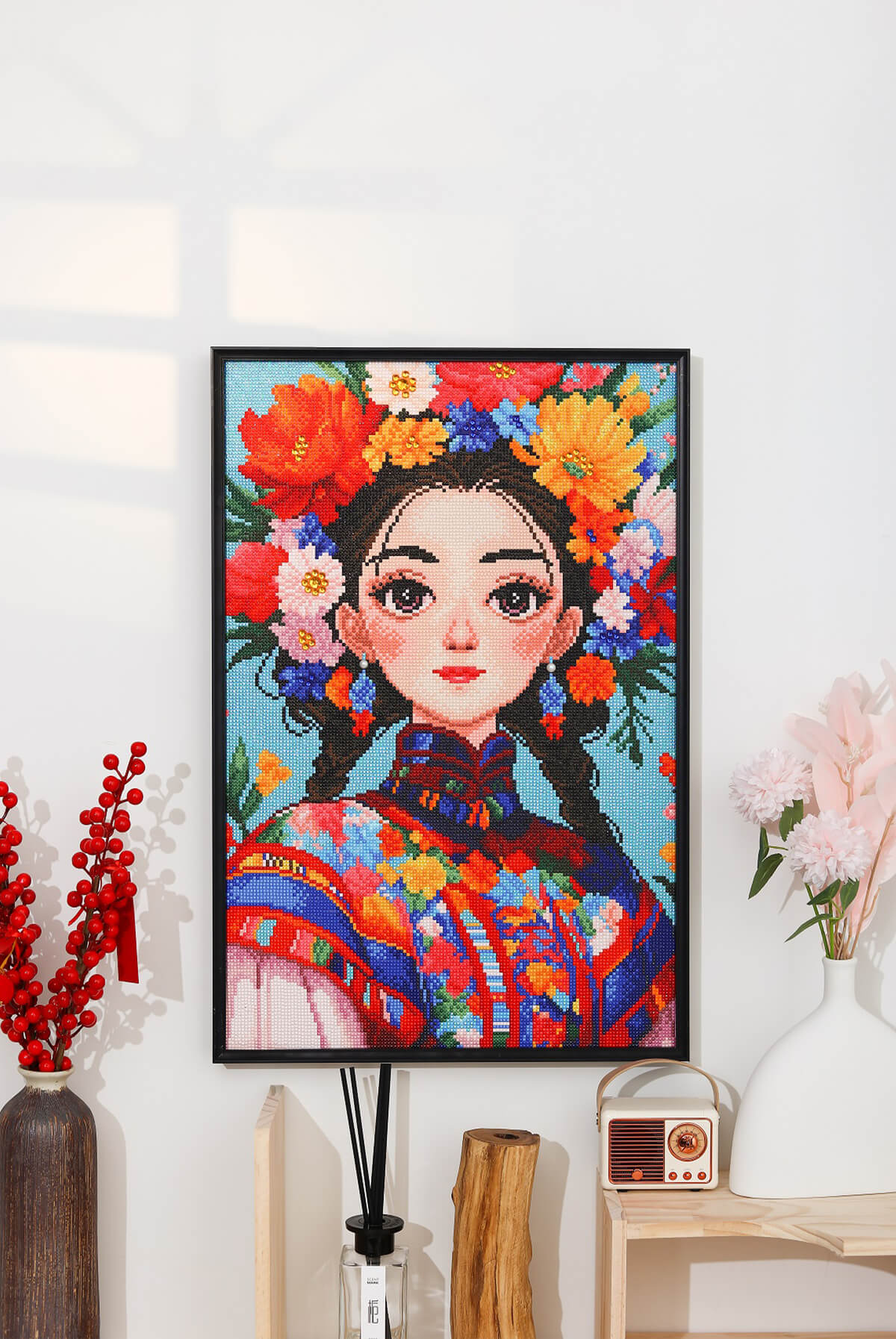 Ethnic Chic Girl diamond painting kit mounted as wall art in a living room, offering a unique diamond painting for home decor.