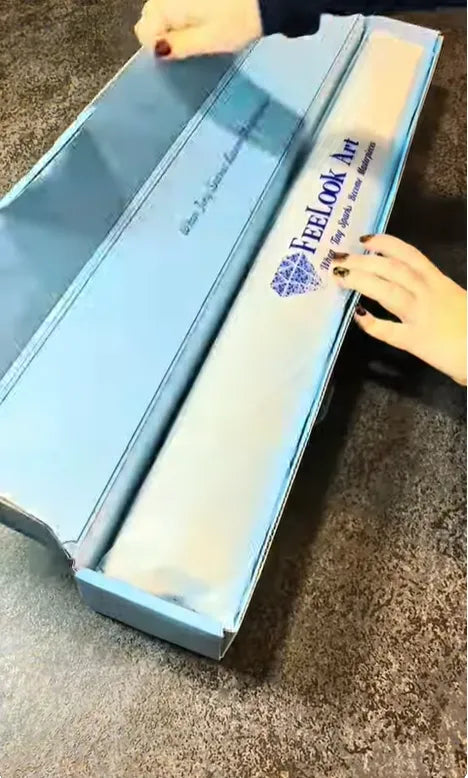 Customer unboxing a blue diamond painting kit package - FEELOOK Art