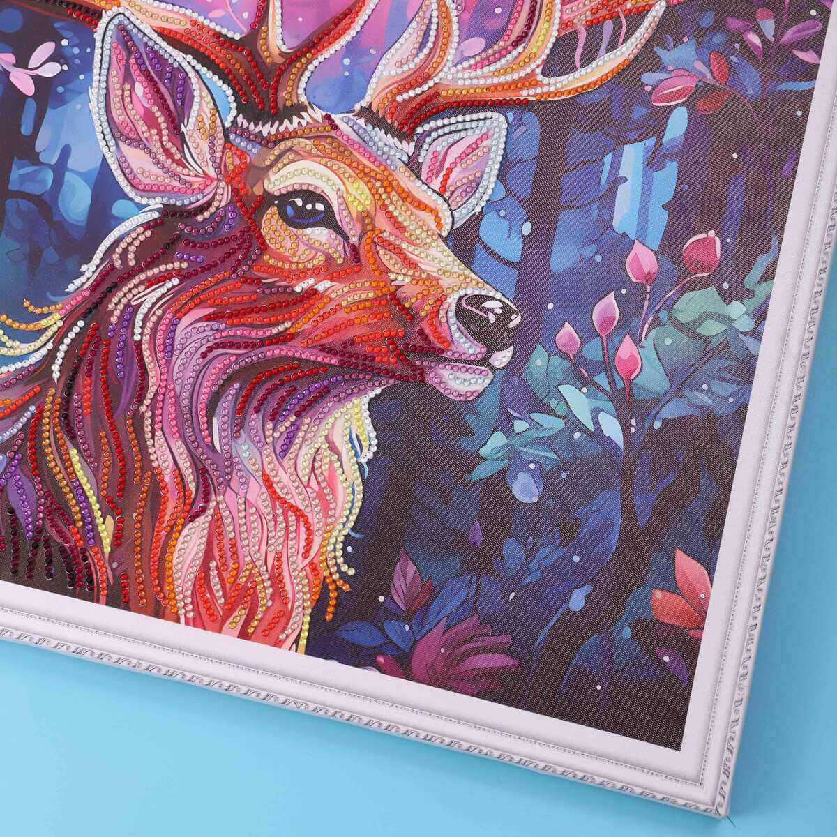 Close-up of the Forest Moose in the diamond painting canvas, highlighting the intricate details and vibrant colors of the antlers and surroundings.
