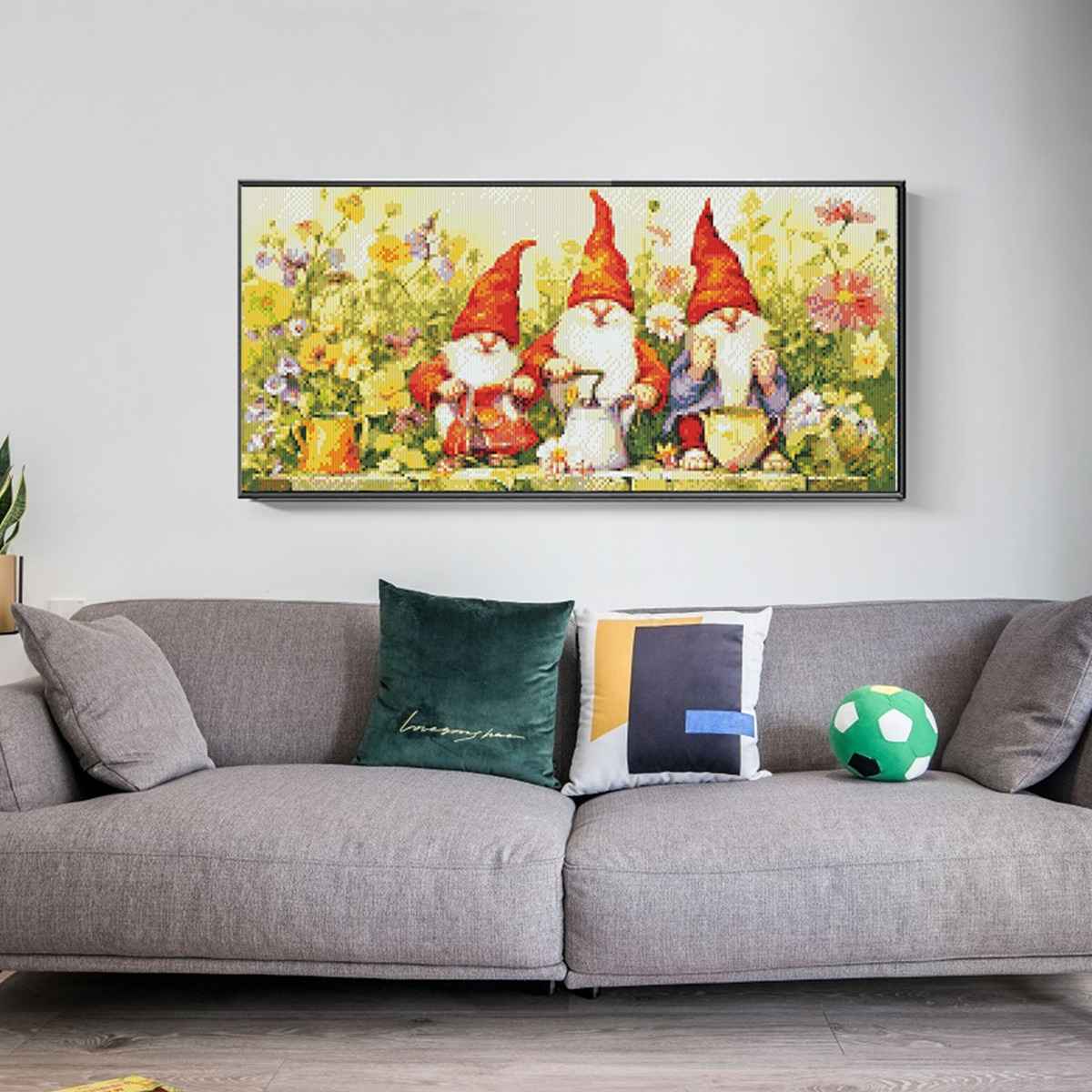 Garden Gnome diamond painting displayed in an outdoor garden space