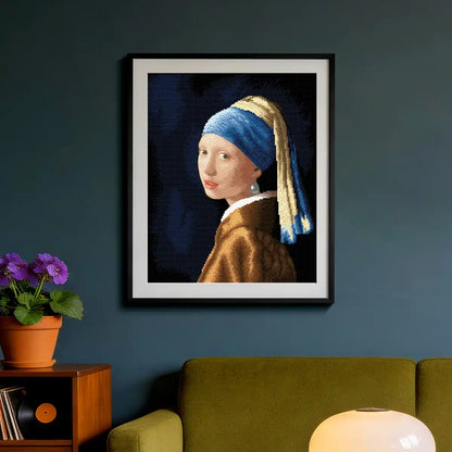 Girl with a Pearl Earring diamond painting displayed in elegant modern living room with warm artistic atmosphere - FEELOOK Art