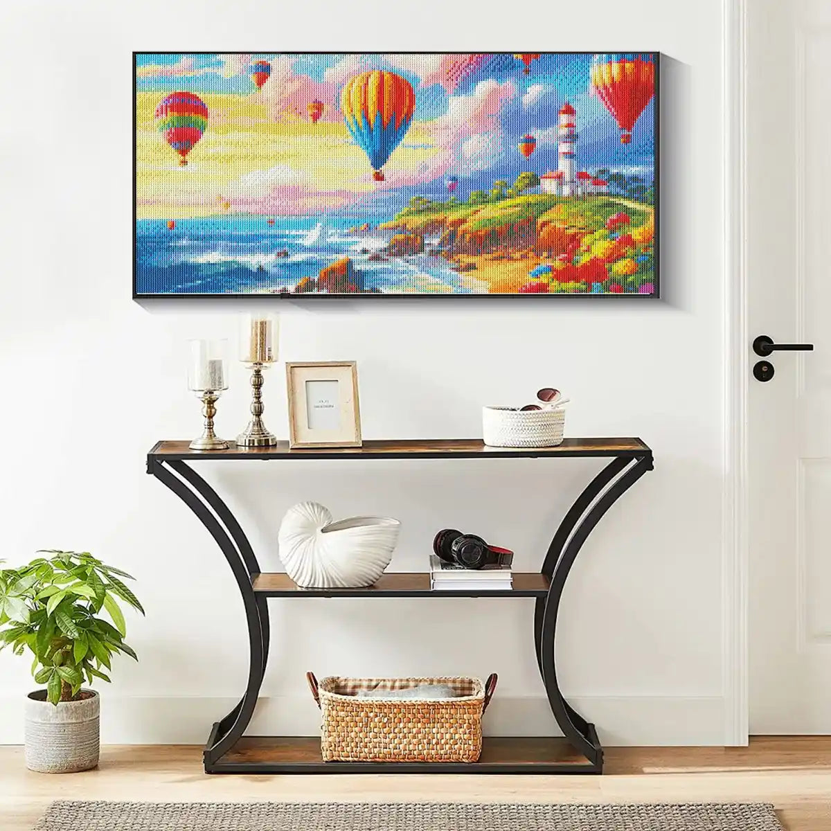 Vibrant balloon and lighthouse art framed in a coastal-themed interior.