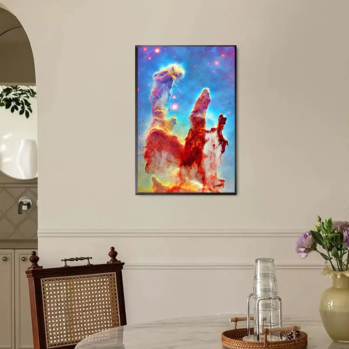 Cosmic art diamond painting Nebula Peaks framed in a creative home office wall.