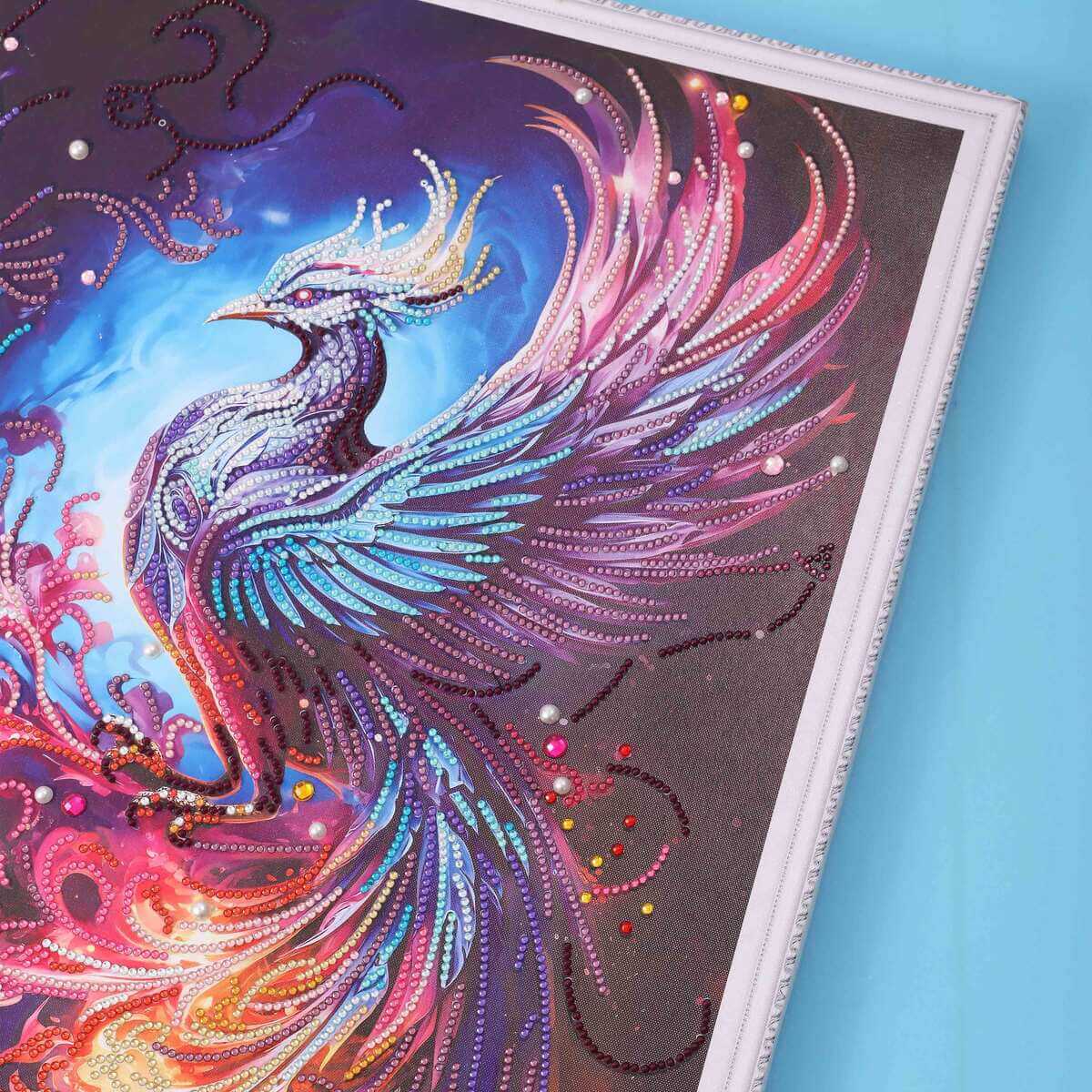 Close-up of Phoenix diamond painting highlighting vibrant flames and intricate feathers.