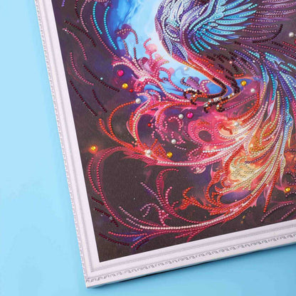 Detailed view of the Phoenix’s fiery wings and glowing colors with shimmering diamonds.