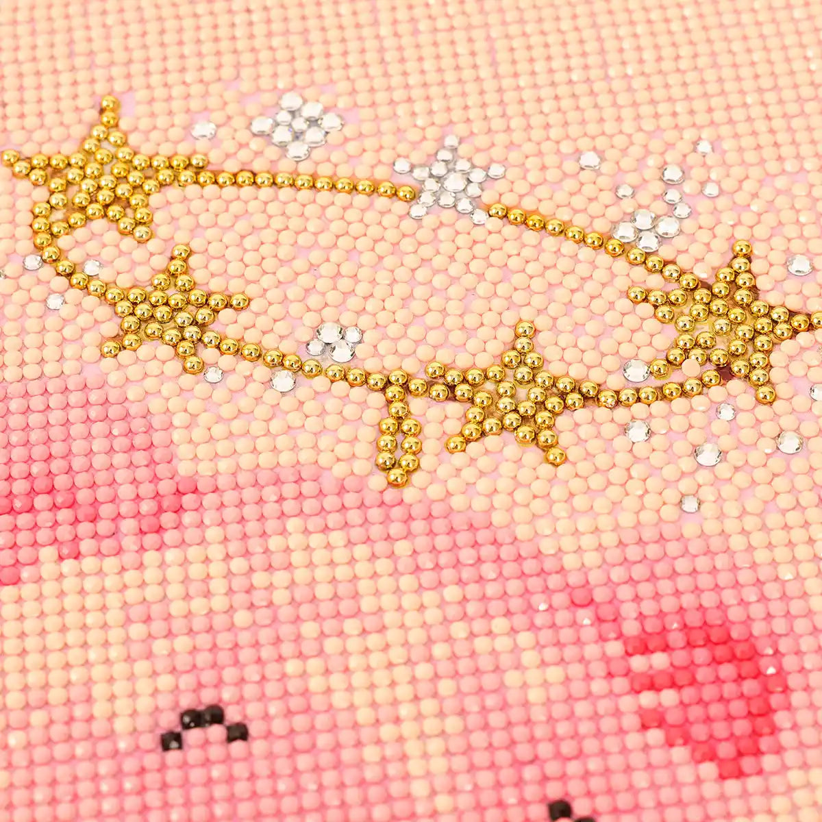 Closeup of Pink Teddy diamond painting showing sparkling diamond drills and detailed pink design - FEELOOK Art