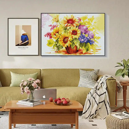Bright sunflower painting displayed on farmhouse living room wall.
