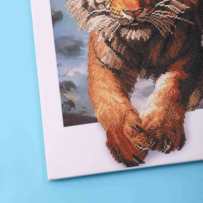 Close-up of the tiger's fierce face and intricate fur details in the diamond painting, showcasing the depth and texture of this round drill diamond painting.