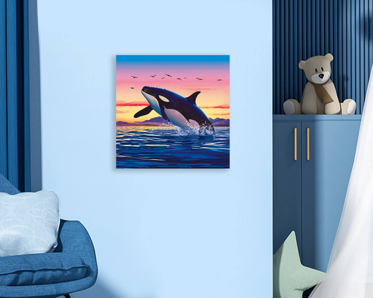 Whale diamond art kit displayed on the wall, capturing the serene beauty of a whale swimming beneath the sunset, perfect for diamond painting home decor.