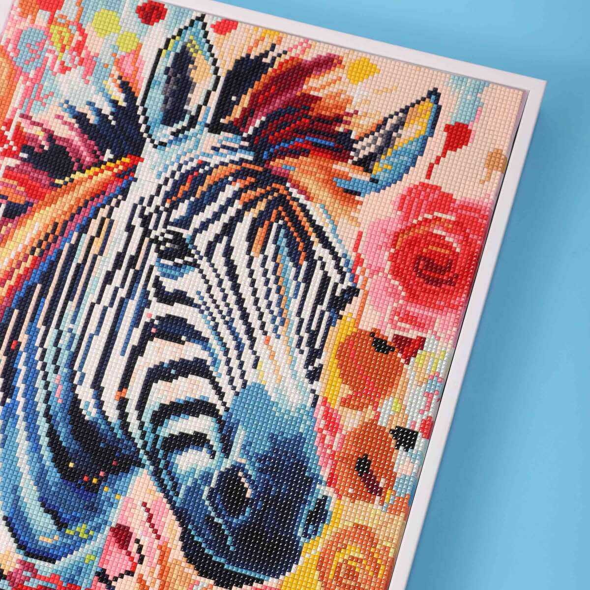 Close-up of the zebra’s black-and-white stripes in the diamond painting canvas, with each tiny diamond adding life and texture to the artwork.