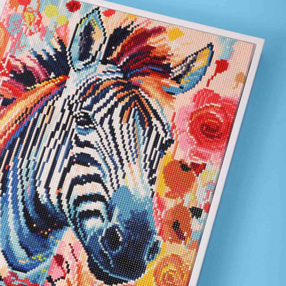 Close-up of the zebra’s black-and-white stripes in the diamond painting canvas, with each tiny diamond adding life and texture to the artwork.